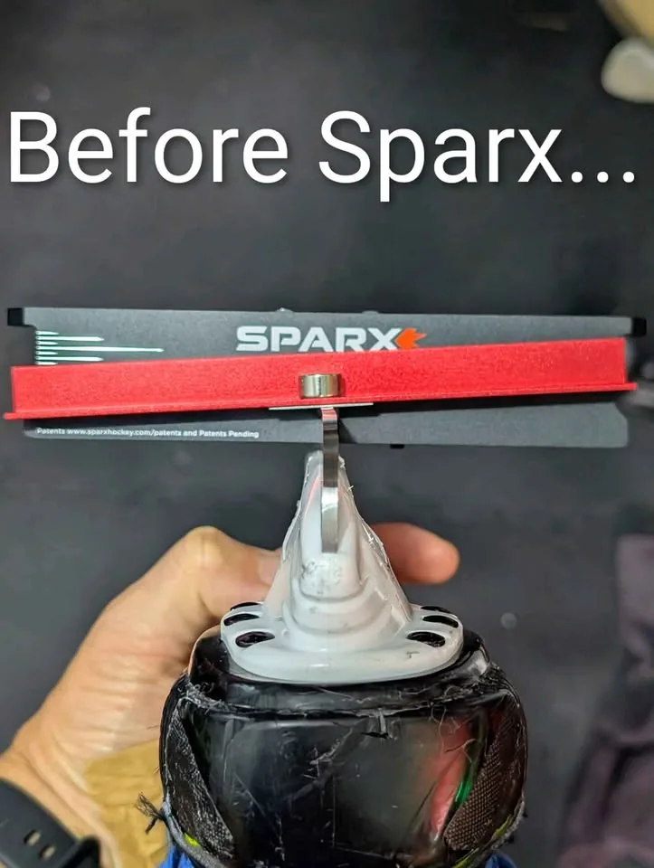 A skate blade before sharpening — uneven, worn edge